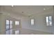 Bedroom with water views and multiple windows at 13064 Via Flavia, Placida, FL 33946