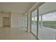 Living room with sliding doors that open to a patio at 13064 Via Flavia, Placida, FL 33946