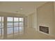 Bright living room with fireplace and water views at 13064 Via Flavia, Placida, FL 33946