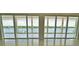 Stunning water view from expansive window wall at 13064 Via Flavia, Placida, FL 33946