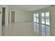 Bright and airy bedroom with water views and balcony access at 13064 Via Flavia, Placida, FL 33946