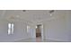 Bright bedroom with ensuite bathroom access at 13064 Via Flavia, Placida, FL 33946