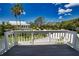 Spacious deck overlooking a beautiful waterfront landscape at 13064 Via Flavia, Placida, FL 33946