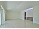 Large bonus room with tile floors and access to balcony at 13064 Via Flavia, Placida, FL 33946
