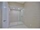 Modern bathroom with a glass shower enclosure and stylish tile at 13064 Via Flavia, Placida, FL 33946