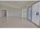 Open concept living space with access to patio at 13064 Via Flavia, Placida, FL 33946