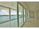 Living room with access to patio and water views at 13064 Via Flavia, Placida, FL 33946