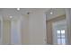 Bright hallway with access to rooms and water views at 13064 Via Flavia, Placida, FL 33946