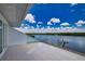 Enjoy breathtaking water views from this expansive balcony at 13064 Via Flavia, Placida, FL 33946