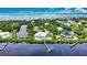 Luxury waterfront home; private dock and inground pool; beautiful landscaping at 13064 Via Flavia, Placida, FL 33946