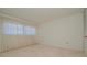 Simple bedroom with large windows and closet at 1884 Dolphin S Blvd, St Petersburg, FL 33707