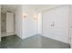 Bright entryway with double doors and slate tile flooring at 1884 Dolphin S Blvd, St Petersburg, FL 33707
