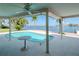 Inviting kidney-shaped pool with water view at 1884 Dolphin S Blvd, St Petersburg, FL 33707