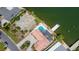 Aerial view of waterfront property with a pool and dock at 1884 Dolphin S Blvd, St Petersburg, FL 33707