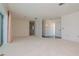 Large living area with light walls and carpet at 1884 Dolphin S Blvd, St Petersburg, FL 33707
