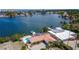 Aerial view of waterfront home with private pool and dock at 1884 Dolphin S Blvd, St Petersburg, FL 33707