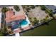 Aerial view of waterfront property with pool and dock at 1884 Dolphin S Blvd, St Petersburg, FL 33707