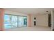Living room with water views and access to a patio and pool at 1884 Dolphin S Blvd, St Petersburg, FL 33707