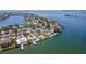 Aerial view of waterfront homes and properties with boat docks at 1884 Dolphin S Blvd, St Petersburg, FL 33707