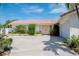 Single story home with pink door and tile roof at 1884 Dolphin S Blvd, St Petersburg, FL 33707