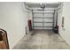 Attached garage with automatic opener and ample storage space at 7643 Ginger Lily Ct, Tampa, FL 33619