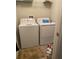 Laundry room with washer and dryer at 7643 Ginger Lily Ct, Tampa, FL 33619