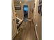 Hallway with vinyl flooring and couch at 7643 Ginger Lily Ct, Tampa, FL 33619