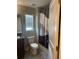 Simple bathroom with shower/tub combo and neutral colors at 7643 Ginger Lily Ct, Tampa, FL 33619