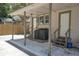 Covered patio area with laundry hookups and grill at 1817 20Th S Ave, St Petersburg, FL 33712
