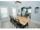 Long farmhouse style dining table with black chairs at 1817 20Th S Ave, St Petersburg, FL 33712