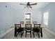 Dining room with wood table and chairs, and view of kitchen at 1817 20Th S Ave, St Petersburg, FL 33712