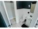 Bathroom with toilet, sink, and access to another room at 1817 20Th S Ave, St Petersburg, FL 33712