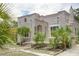 Spanish style home with stucco exterior, landscaping, and front porch at 1817 20Th S Ave, St Petersburg, FL 33712