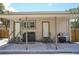 Covered patio area with laundry hookups and grill at 1817 20Th S Ave, St Petersburg, FL 33712