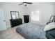 Comfortable bedroom with a queen bed and a dresser at 1817 20Th S Ave, St Petersburg, FL 33712