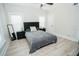 Well-lit bedroom with queen bed and stylish nightstands at 1817 20Th S Ave, St Petersburg, FL 33712