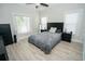 Spacious bedroom with a queen bed and two nightstands at 1817 20Th S Ave, St Petersburg, FL 33712