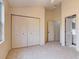 Bedroom with double doors leading to a closet and bathroom at 2745 Enterprise E Rd # 24, Clearwater, FL 33759