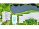 Aerial view showing community pool and pond at 2745 Enterprise E Rd # 24, Clearwater, FL 33759