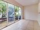 Bright dining area with sliding glass doors leading to a private patio at 2745 Enterprise E Rd # 24, Clearwater, FL 33759