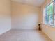 Spacious bedroom featuring a large window and wall-to-wall carpet at 2745 Enterprise E Rd # 24, Clearwater, FL 33759