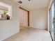 Bright dining area with sliding glass doors leading to the backyard at 2745 Enterprise E Rd # 24, Clearwater, FL 33759