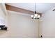 Spacious dining room with a chandelier and access to kitchen at 2745 Enterprise E Rd # 24, Clearwater, FL 33759