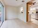Dining area with kitchen views and access to a patio at 2745 Enterprise E Rd # 24, Clearwater, FL 33759