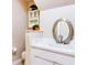 Small bathroom with a vanity, toilet, and a decorative mirror at 2745 Enterprise E Rd # 24, Clearwater, FL 33759