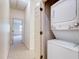 Stackable washer and dryer in convenient laundry closet at 2745 Enterprise E Rd # 24, Clearwater, FL 33759
