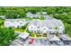 Aerial view of community with townhouses and tennis court at 2745 Enterprise E Rd # 24, Clearwater, FL 33759