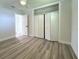 Spacious bedroom with vinyl plank flooring and built-in closet at 501 20Th Ave, Indian Rocks Beach, FL 33785