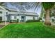 Updated condo with a well-manicured lawn and a charming front entrance at 1211 N Mcmullen Booth Rd # 1211, Clearwater, FL 33759