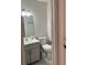 Clean bathroom with updated vanity and toilet at 1211 N Mcmullen Booth Rd # 1211, Clearwater, FL 33759